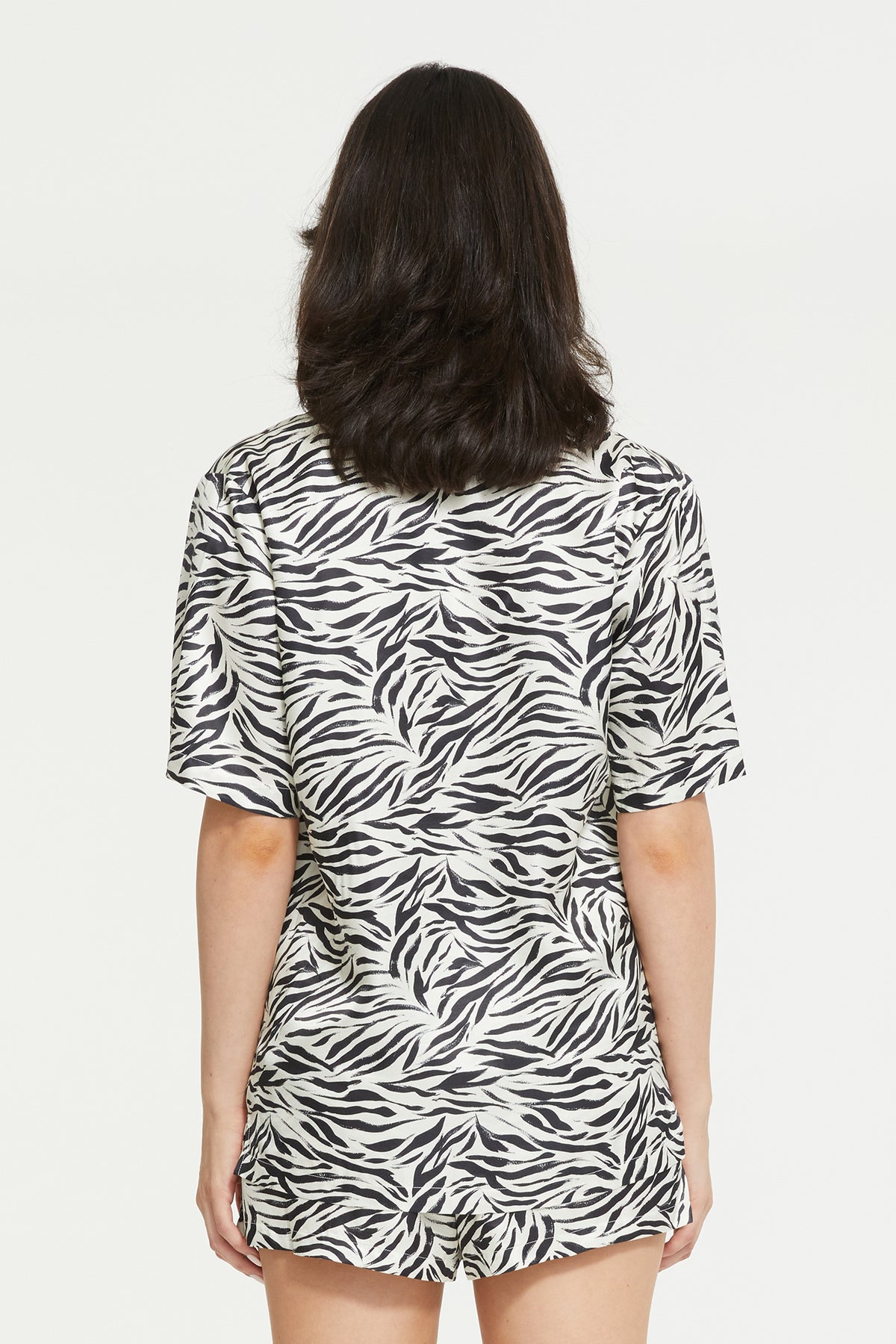 The Zafina Short Sleeve Top in Brush Zebra Print by Ginia