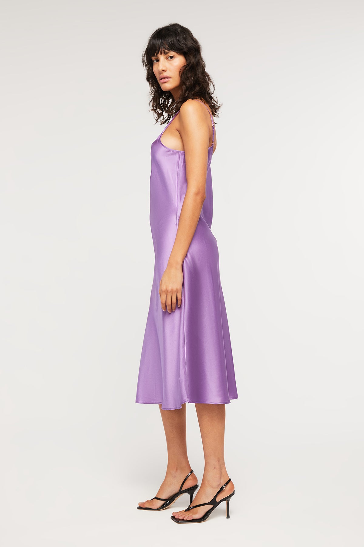Crafted from pure silk, the Delilah Slip in Amethyst is a luxurious long slip from Ginia RTW